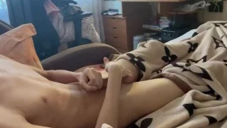 A young guy jerks off a huge cock in the morning