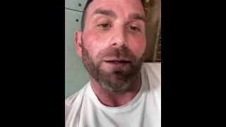 Construction worker solo male masturbation on job site.