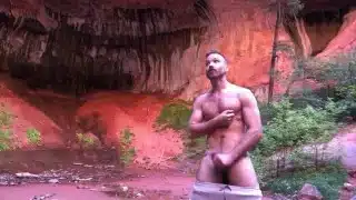 Cute jock jacking off in nature